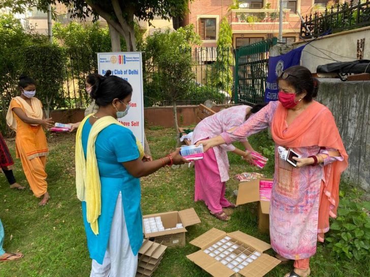 Distributed sanitary napkins and deodorant to 100 ladies
