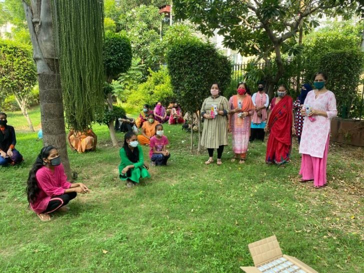 Distributed sanitary napkins and deodorant to 100 ladies