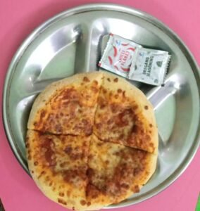Pizza Party Given to Orphanage Children at Sarita Vihar on Kaumudi Sharma's Birthday